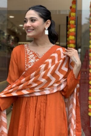 Women's Rust Orange Rayon Pleated Kurta Set with Chevron Print Malmal Dupatta